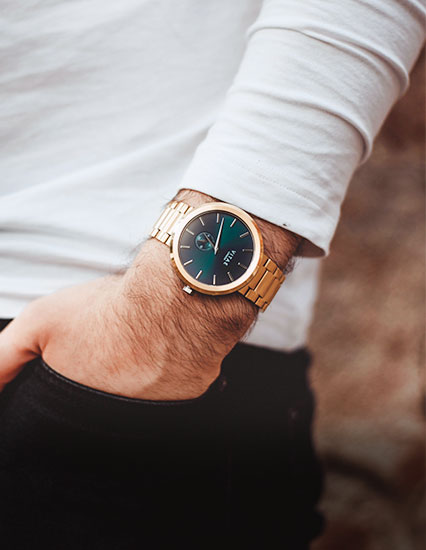 Emerald Gold Watch